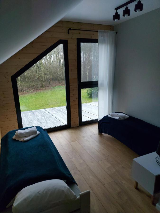 Villa Dom Przy Lesie à Wielgie Extérieur photo